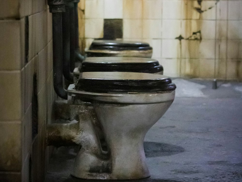 Before: Leaking urinal lines and a recurring kitchen drain blockage during trading hours.