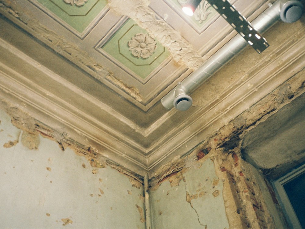 Before: Water bill had tripled and the unit below reported a damp ceiling.
