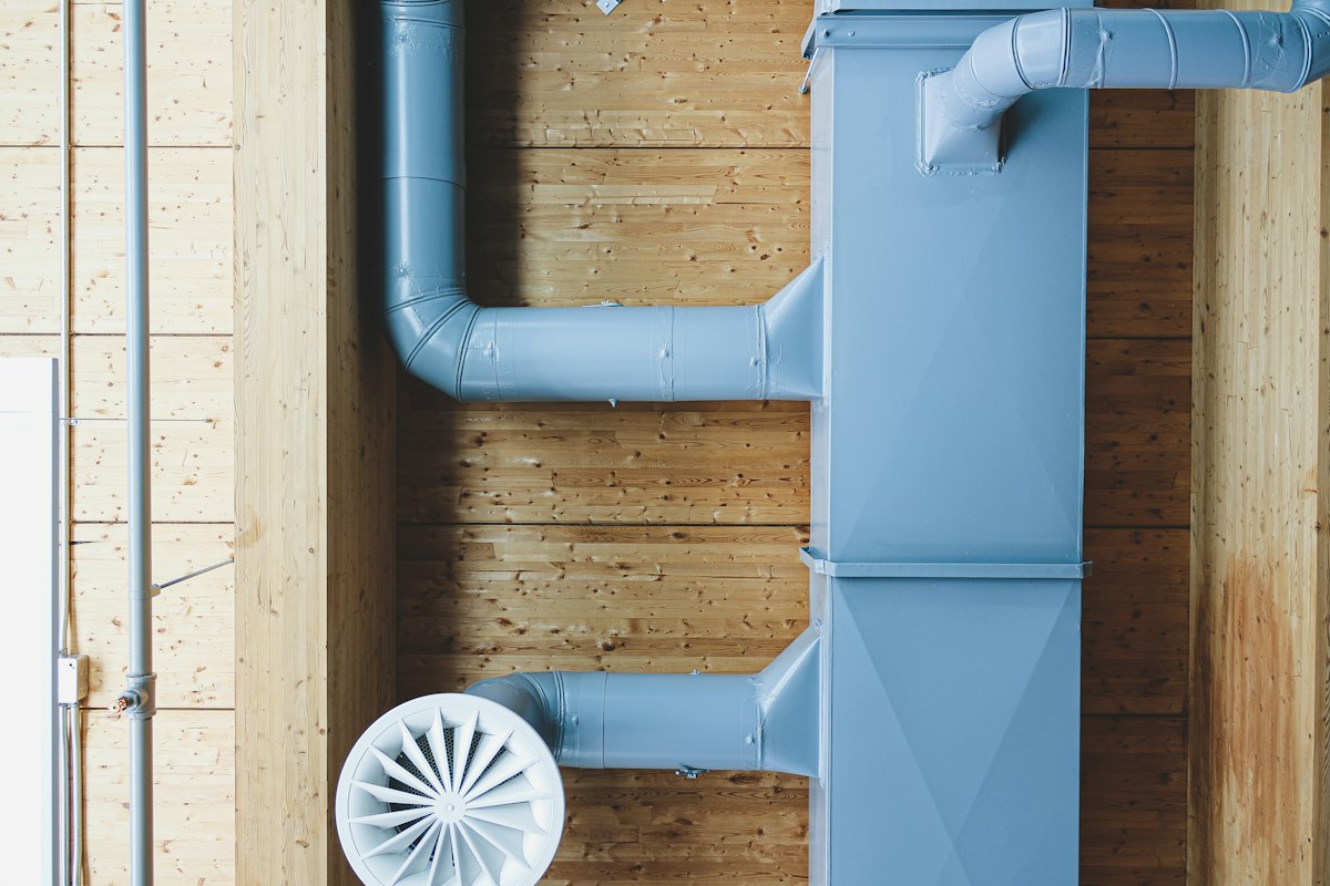 Illustration of old rusted pipes next to new clean pipes